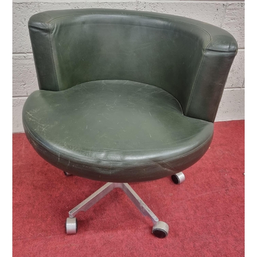 1463 - A Green Leather Low back Swivel Chair.