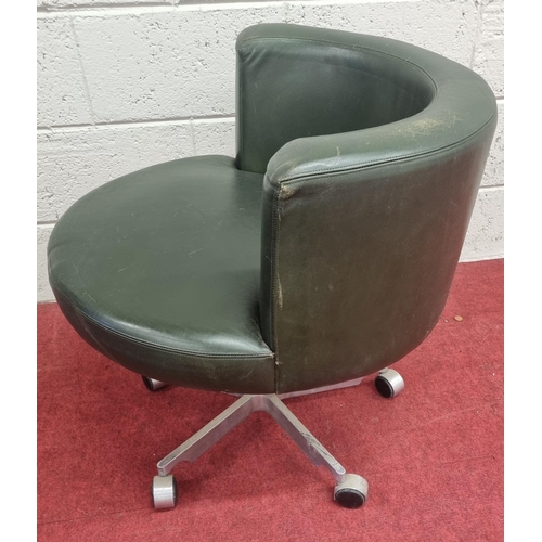 1463 - A Green Leather Low back Swivel Chair.