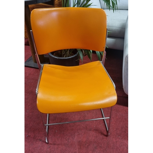 1467 - A Mid Century Orange Metal Chair.
Sold with the option to buy up to 6 of them. (Generic Photo differ... 