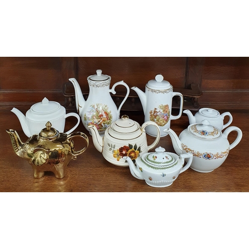 1511 - A Group of Assorted Teapots.