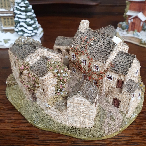 1513 - A Collection of Lilliput Lane Miniature Houses  and Festive Examples.