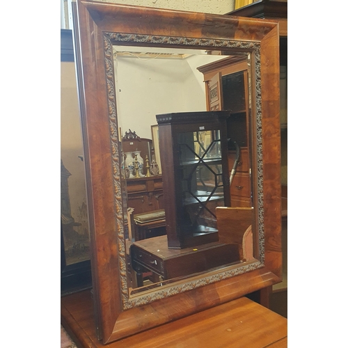 106 - A good pair of early 20th Century Walnut and veneered Mirrors with rectangular bevelled glass.
88 x ... 