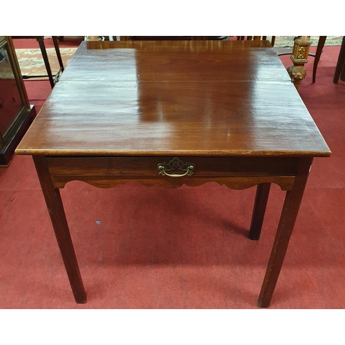 843 - A Georgian Mahogany foldover Tea Table with single frieze drawer. (leg hinge needs repair). w 77 x 7... 