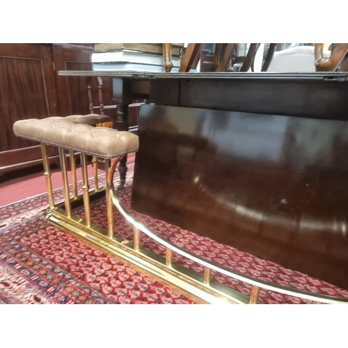 862 - A superb quality large Brass Club Fender with a curved centre and brown deep buttoned corners.
Inter... 