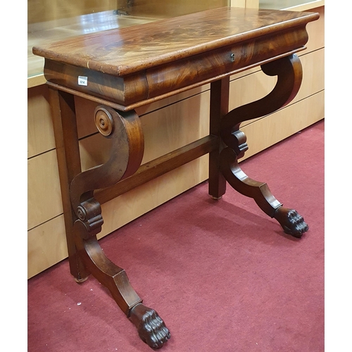 795 - A 19th Century Mahogany Console Table with single frieze drawer and carved cabriole front supports a... 