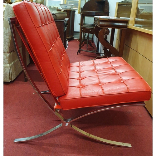 861 - A red leather Chrome frame Barcelona style Chair.
W 75 x SH 41 x BH 83 cm approx.