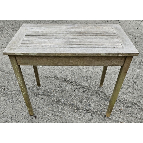 997 - A hardwood garden Table.