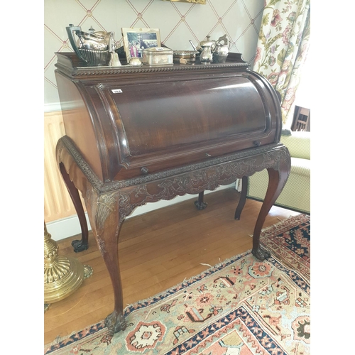 877 - A fabulous late 19th Century Irish Mahogany Cylinder Desk, possibly by Hicks of Dublin, with a highl... 