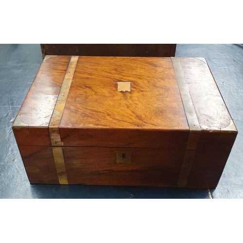 509 - A Victorian Walnut and veneered Campaign Writing Slope along with another Box. 35 x 22 x H 15 cm app... 