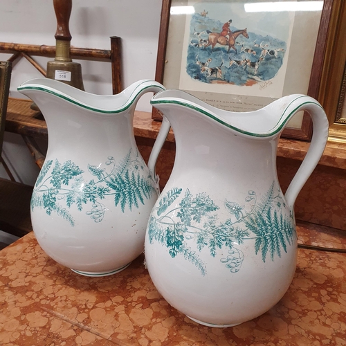 516 - A good pair of 19th Century Porcelain Jugs. H 29 cm approx.