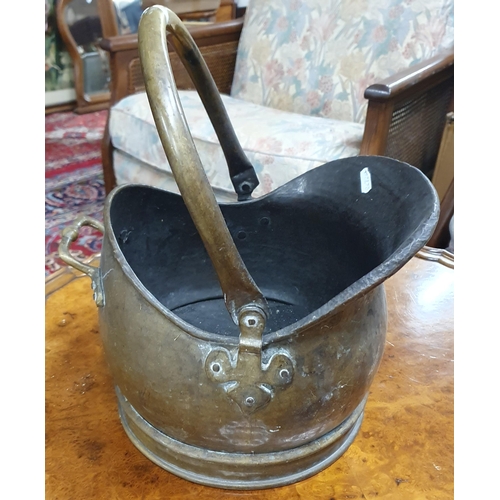 526 - A 19th Century Brass coal Helmet.