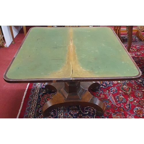 538 - A 19th Century Rosewood and Veneered foldover Card Table with baized interior on octagonal supports ... 