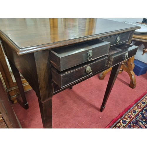 1001 - A 19th Century Mahogany six drawer Side Table with moulded top on square tapered supports.
H 80 x  W... 