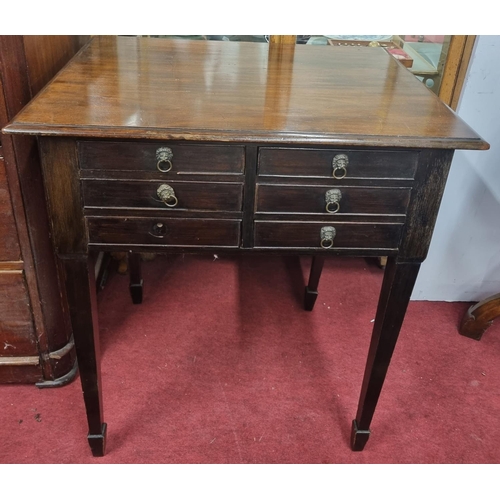 1001 - A 19th Century Mahogany six drawer Side Table with moulded top on square tapered supports.
H 80 x  W... 