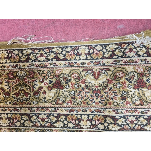 1002 - A large green and cream ground Carpet with multi borders and unique medallion design. 488 x 300 cm a... 