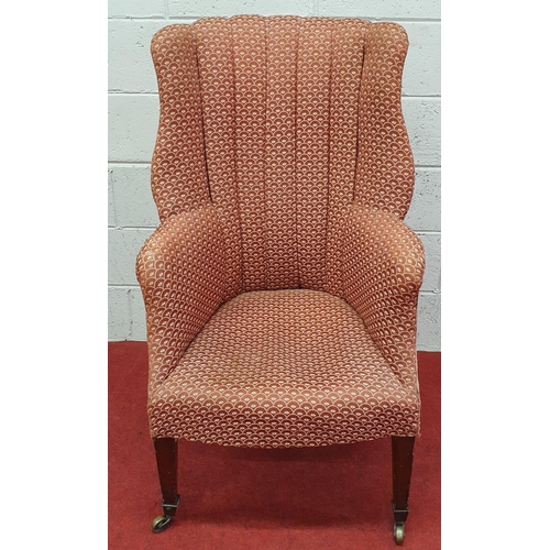 1005 - A good early to mid 19th Century Wingback Armchair on square tapered supports and brass castors. W 6... 