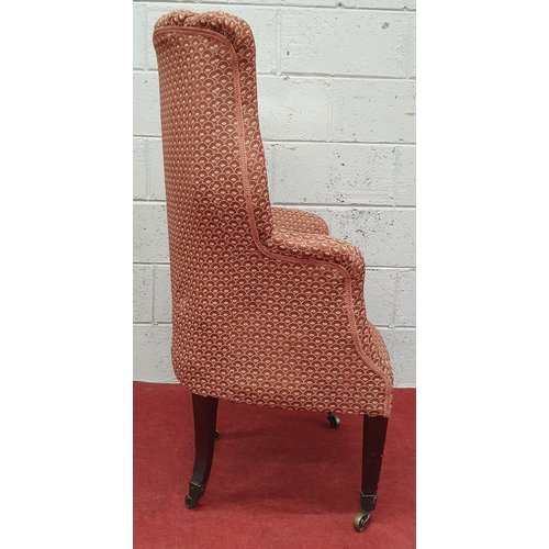 1005 - A good early to mid 19th Century Wingback Armchair on square tapered supports and brass castors. W 6... 