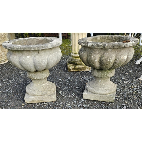 1030 - A pair of Stone Pots.
H 40 x D 39 cm approx.