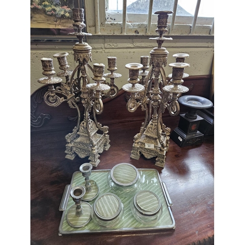 85 - A pair of early 20th Century white Metal Candelabra. H 51 cm approx along with a Pewter vanity Tray.