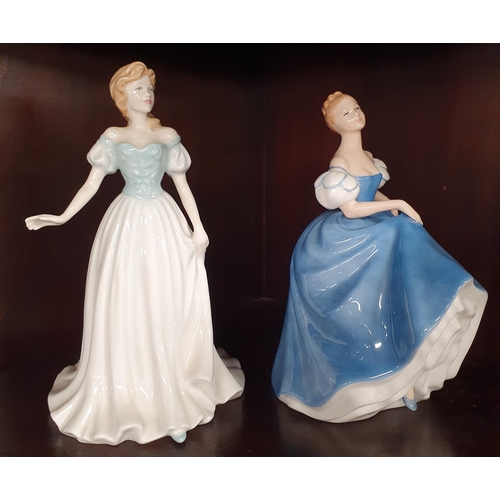 870 - Two Royal Doulton Figurines. 'Summer serenade' and 'Anna'. H 19 cm approx.