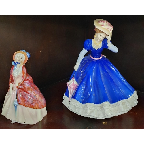 872 - Two Royal Doulton Figurines. 'Paisley Shawl' and 'Mary'. H 22 cm approx.