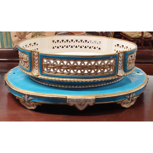 894 - A 19th Century blue ground Porcelain Centrepiece with pierced outline along with three Parianware st... 