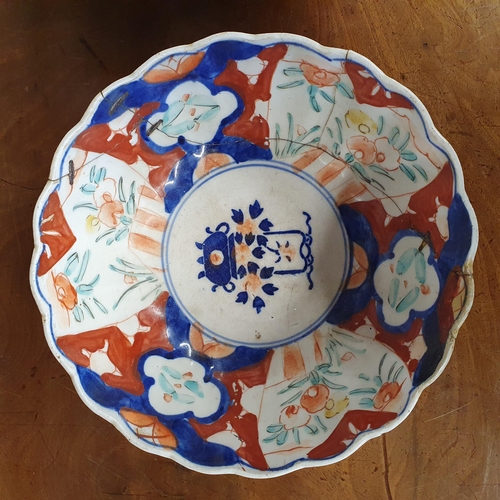 897 - Two Imari patterned Bowls. One AF.
H 13 x D 22 cm approx.