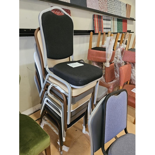 679 - A metal framed staking Chair in different colours.