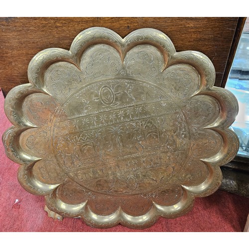 849A - A good heavy Brass Tray with scalloped edge.