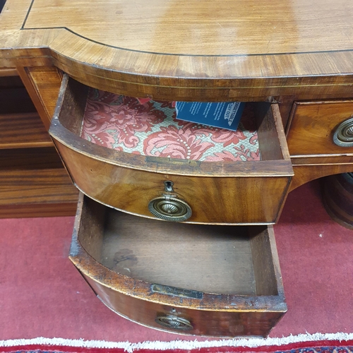 63 - A good early 19th Century Mahogany Bowfronted Sideboard on square tapered supports and ebony inlaid ... 