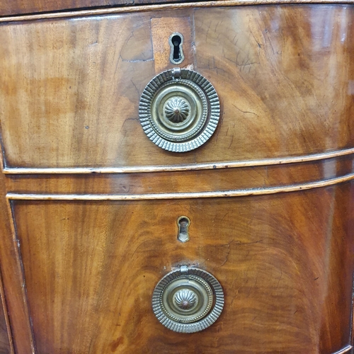 63 - A good early 19th Century Mahogany Bowfronted Sideboard on square tapered supports and ebony inlaid ... 