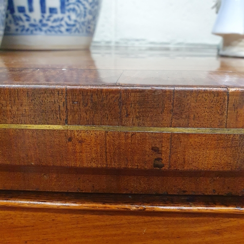 63 - A good early 19th Century Mahogany Bowfronted Sideboard on square tapered supports and ebony inlaid ... 