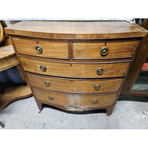 1082 - A 19th Century Mahogany bow fronted Chest of Drawers.