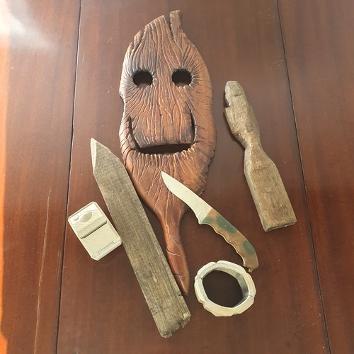 13A - MOONHAVEN HERO LOT Paul Sarno's Wood carved mask ,figures ,2 Knifes and Hand Cuffs.