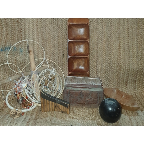 17 - A Group of film prop items to include a carve wooden box, dream catchers, wooden bows ect.