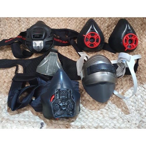 18 - A Group of 6 film prop Gas Masks .