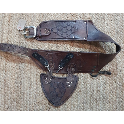 23 - A good brown leather Scabbard.