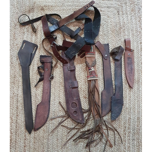 24 - A Group of brown Leather Scabbards.