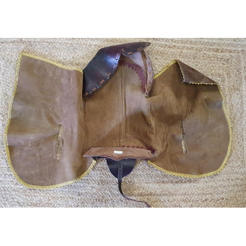 36 - A Group of 5 leather Saddles .