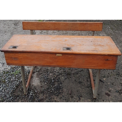 62 - A Double seats School desk.
Metal framed wooden seat.