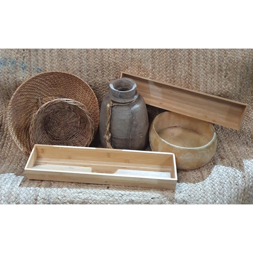 8 - A group of wicker and wooden items.