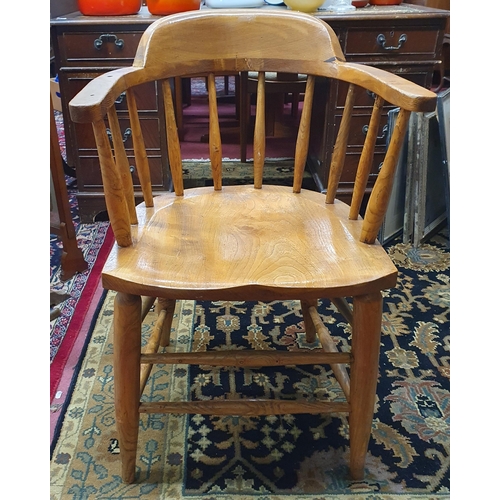 177 - A late 19th early 20th Century Elm Smokers Chair on turned supports. W 56 x SH 46 cm approx.