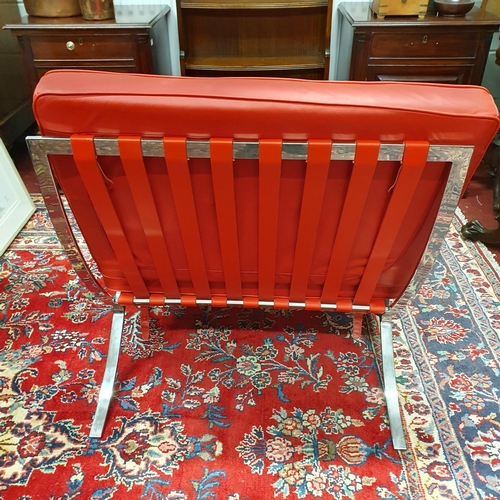 223 - A good Barcelona style Chair with Chrome detail and deep buttoned red cushions. W 75 x SH 41 x BH 83... 