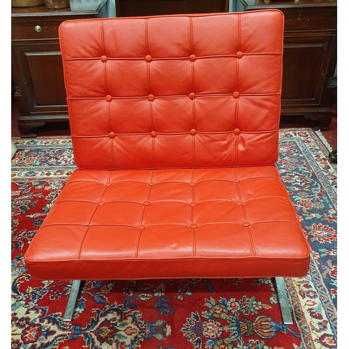 223 - A good Barcelona style Chair with Chrome detail and deep buttoned red cushions. W 75 x SH 41 x BH 83... 