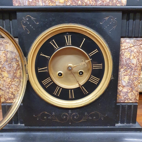 232 - A 19th Century black slate Mantel Clock with rouge marble inserts. 33 x 16 x H 38 cm approx.