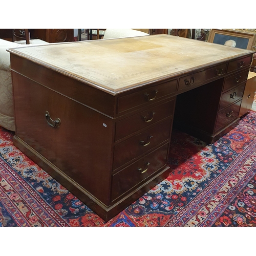 256 - A Fantastic Georgian style Mahogany Partners Desk of large size with cream/brown tooled leather top.... 