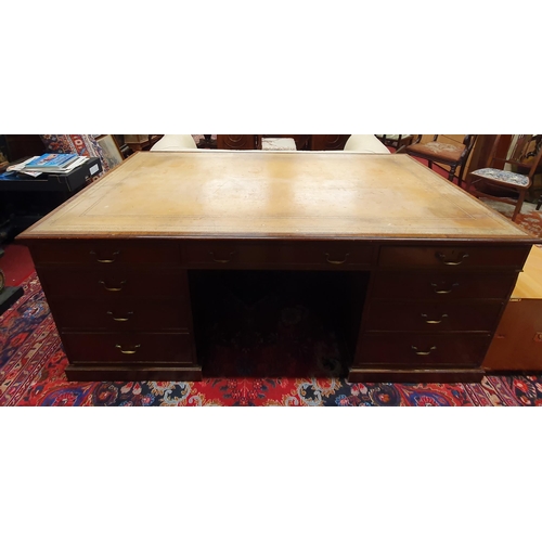 256 - A Fantastic Georgian style Mahogany Partners Desk of large size with cream/brown tooled leather top.... 