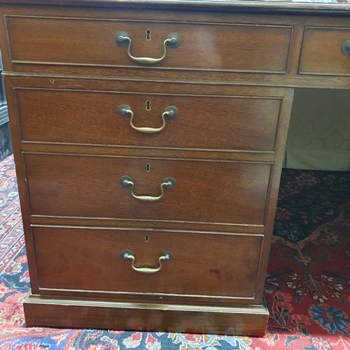 256 - A Fantastic Georgian style Mahogany Partners Desk of large size with cream/brown tooled leather top.... 