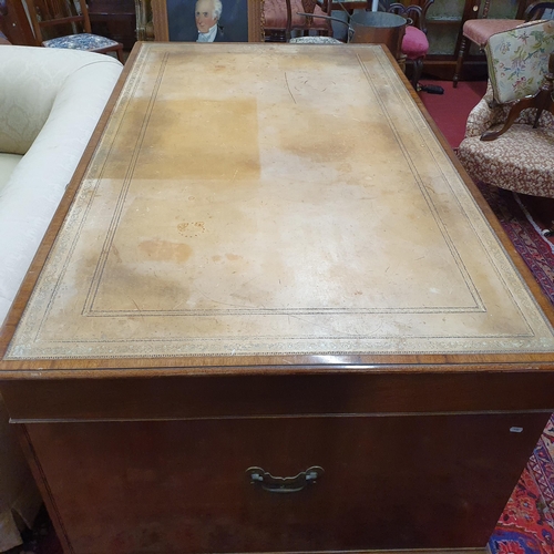 256 - A Fantastic Georgian style Mahogany Partners Desk of large size with cream/brown tooled leather top.... 