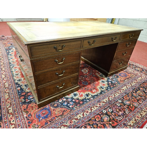 256 - A Fantastic Georgian style Mahogany Partners Desk of large size with cream/brown tooled leather top.... 